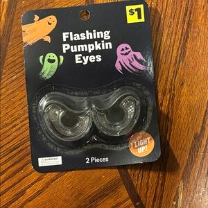 7/$5 or 15/$10 Flashing Pumpkin Eyes Light-Up Accessory